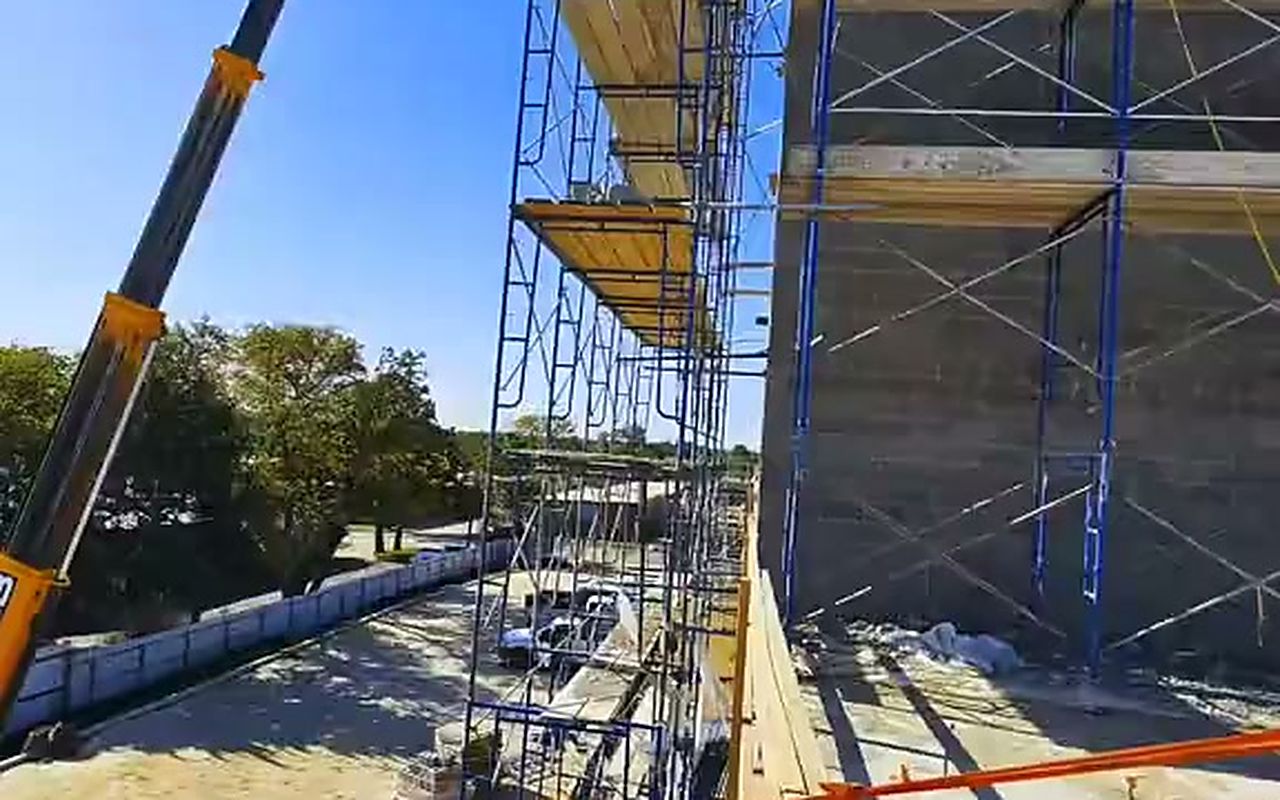Frame scaffolding and a lift on a Texas Pro job site